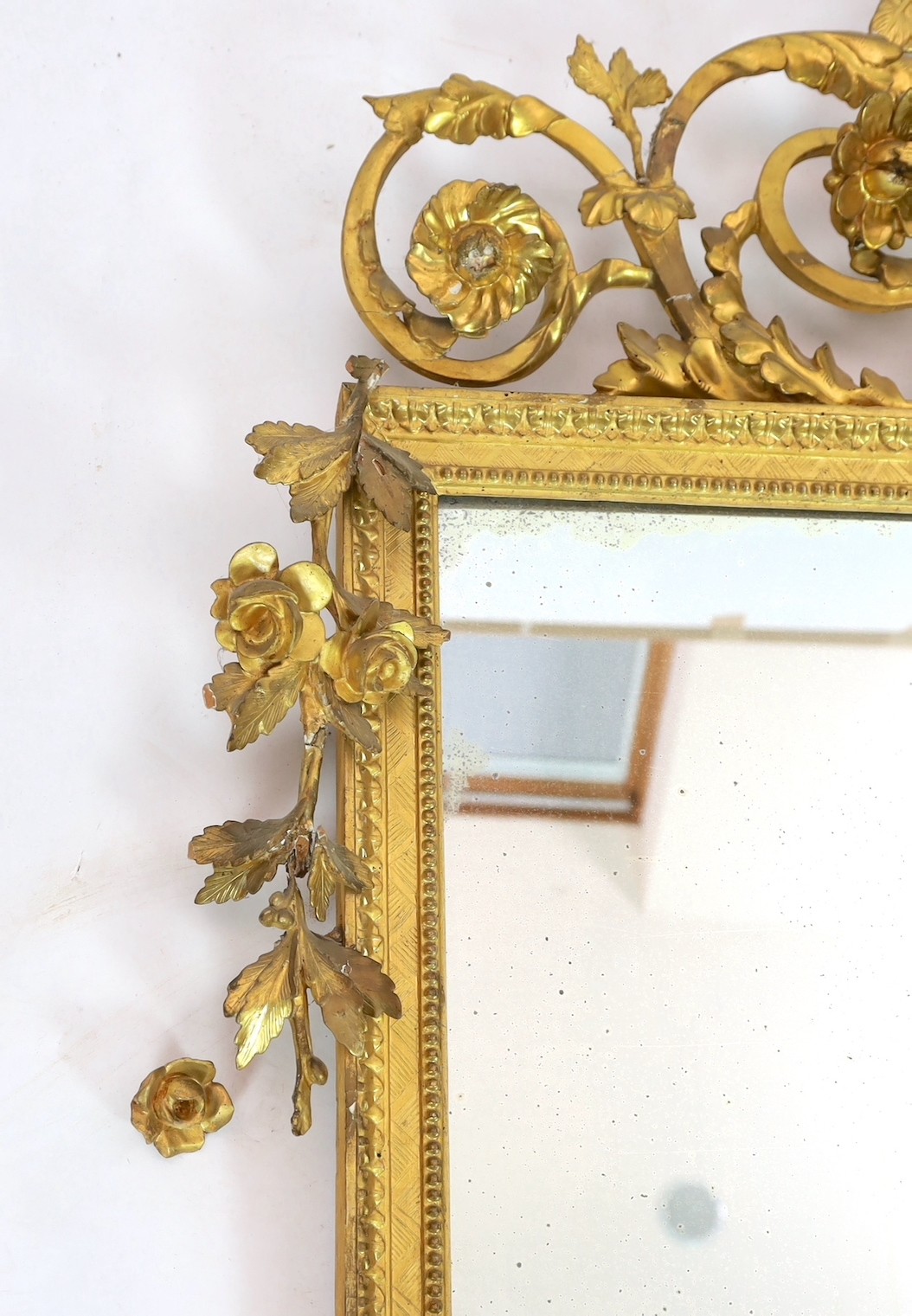 A 19th century carved giltwood wall mirror, width 126cm, height 118cm
